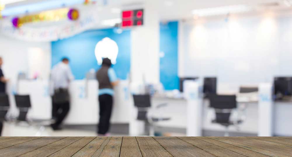 Customers inside of a credit union. 