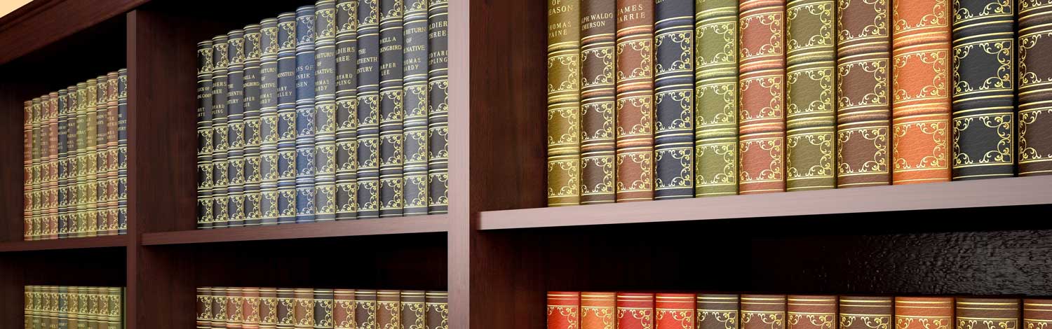 Legal books on a shelf. Law firm cyber attacks continue to rise. 