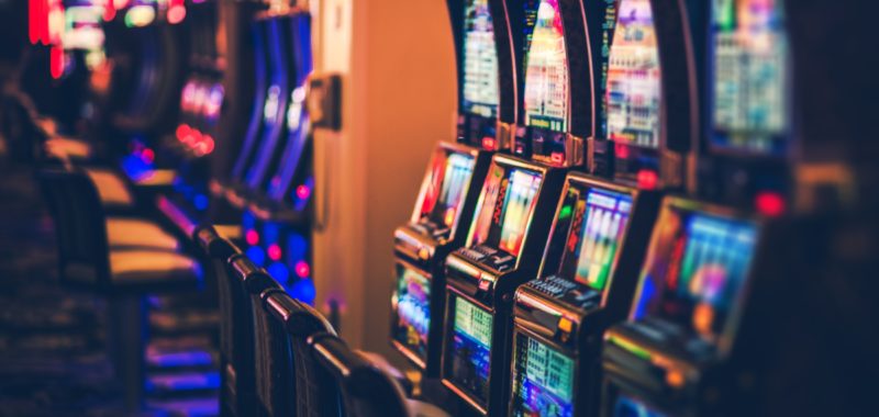 A series of slot machines in a row. Casino cybersecurity continues to be a growing problem. 