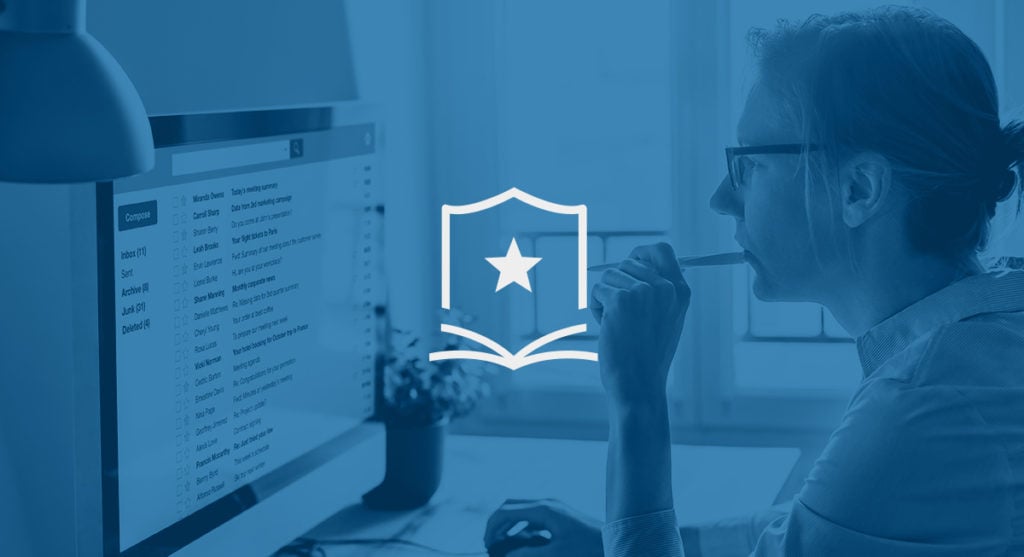Woman looking at her computer screen. Star icon in the middle of the image.